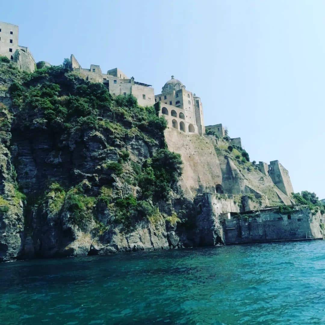 castello aragonese in ischia with guest of ring hostel in Forio