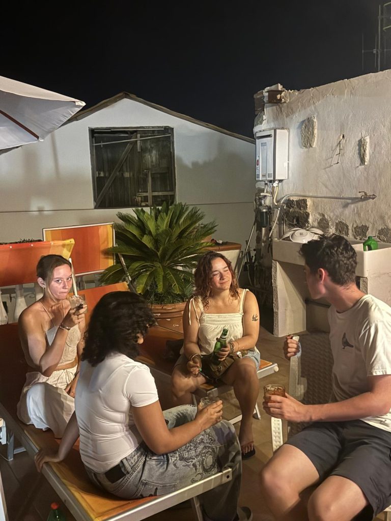 Home - Italiano hostel life on the terrace of ring hostel in ischia